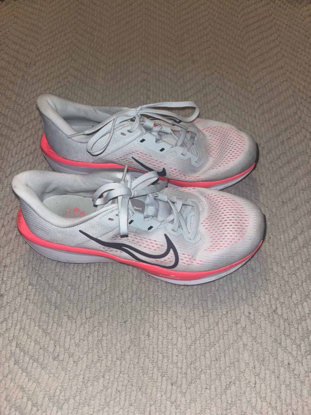 Nike Women’s White Athletic Running Shoes with Pink Accents